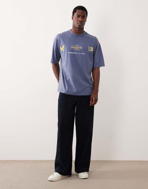 ASOS DESIGN - Oversized uniseks T-shirt met Goodyear-prints in blauw met wassing, 2 van 5