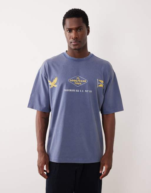 ASOS DESIGN - Oversized uniseks T-shirt met Goodyear-prints in blauw met wassing, 3 van 5