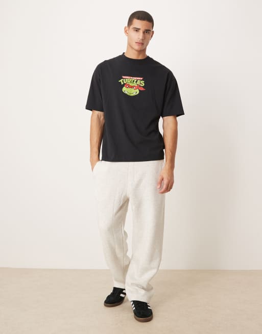 ASOS DESIGN - Oversized uniseks T-shirt met vintage Ninja Turtles-prints in zwart, 2 van 5