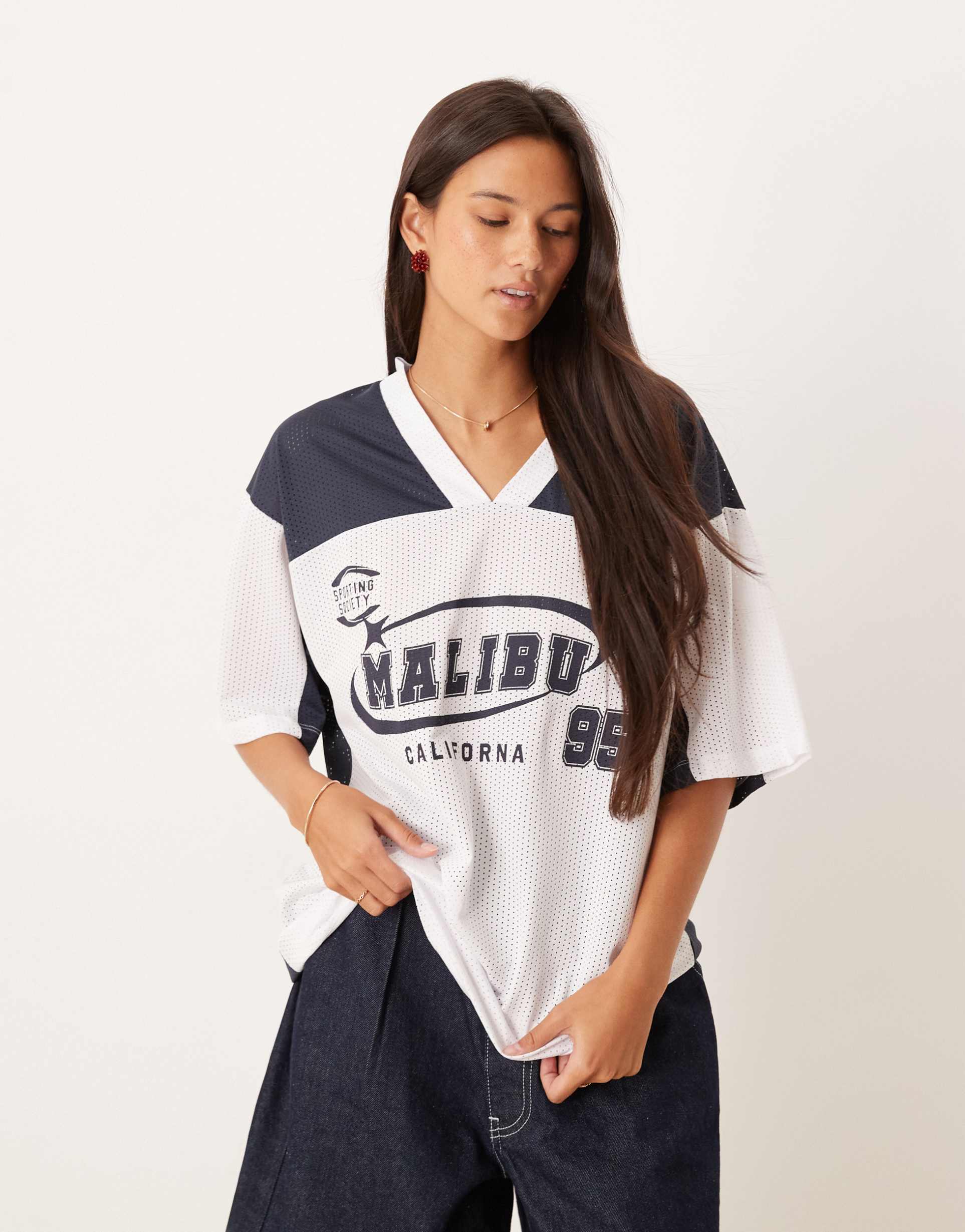 asos design oversized v-neck football t-shirt with graphic