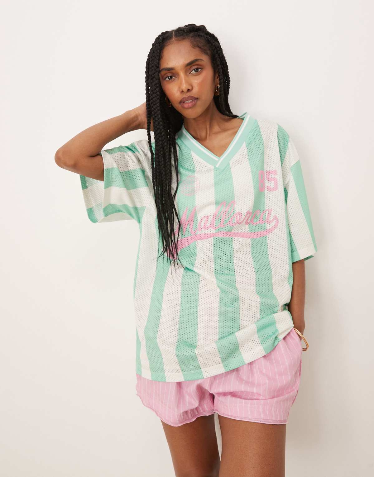 ASOS DESIGN oversized v neck football t-shirt with mallorca graphic in green stripe