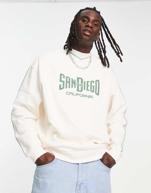 ASOS DESIGN oversized v-neck sweatshirt in off white with San Diego print  and piping