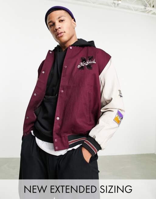 ASOS DESIGN oversized varsity bomber jacket in purple