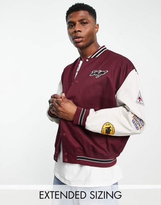 ASOS DESIGN oversized varsity bomber jacket in burgundy