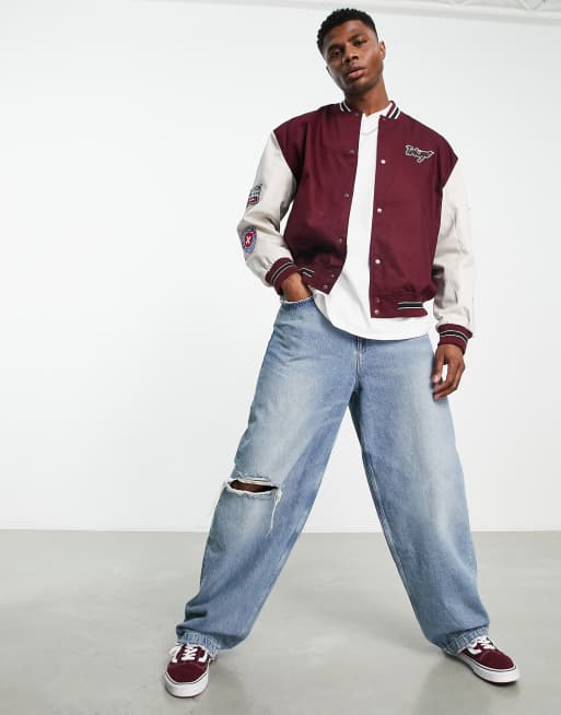 ASOS DESIGN oversized varsity jacket in red with badging and contrast  sleeves