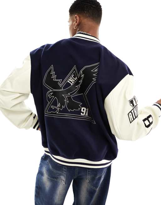 ASOS Design Oversized Varsity Jacket with Badges in Blue