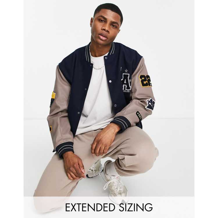 ASOS DESIGN oversized varsity bomber jacket in green and ecru cotton