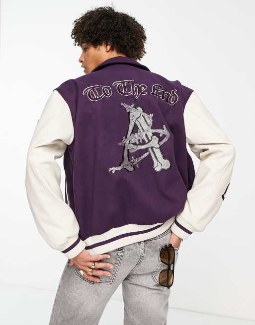 ASOS Design Oversized Varsity Jacket with Badges in Blue