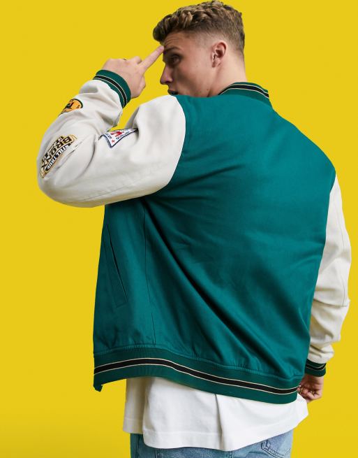 ASOS DESIGN oversized varsity cotton bomber jacket in green with embroidery  badging