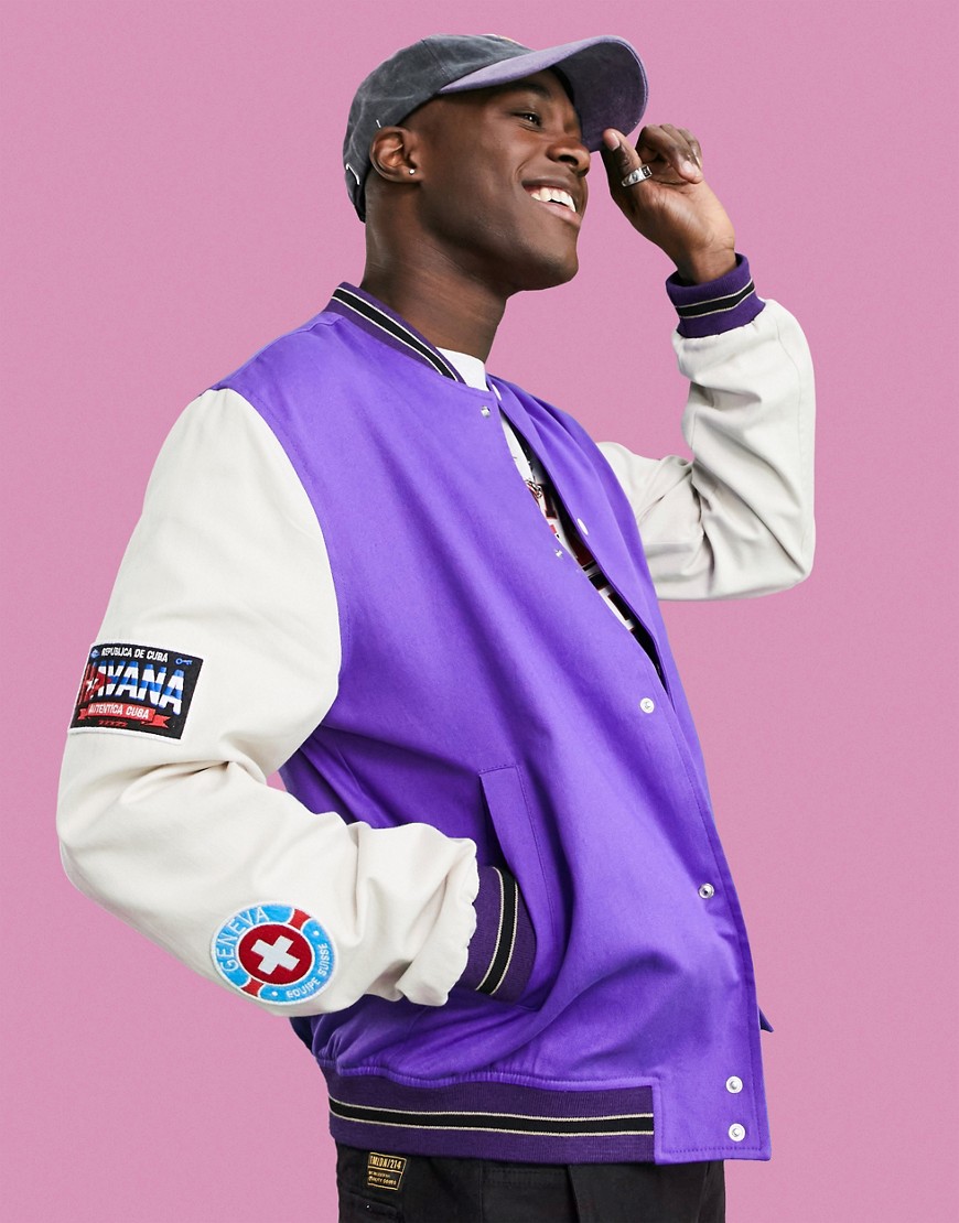 ASOS DESIGN oversized varsity cotton bottom jacket in purple with embroidery badging