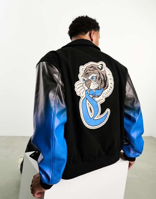 ASOS DESIGN - Oversized varsity jack met badges in zwart met mouwen met kleurverloop