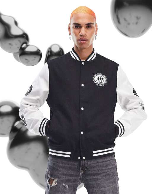 ASOS DESIGN oversized varsity jacket in navy