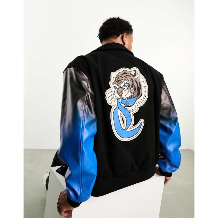 ASOS DESIGN oversized varsity jacket with badges in black with