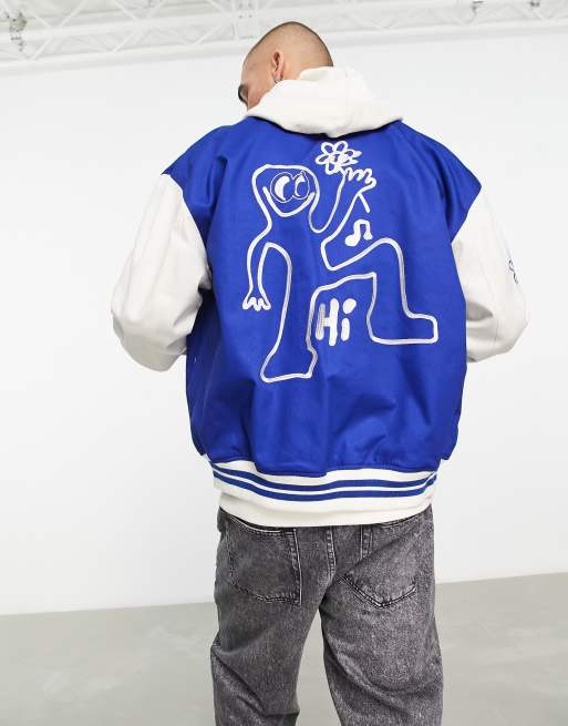 ASOS DESIGN oversized varsity jacket with badges in blue, 2 of 4