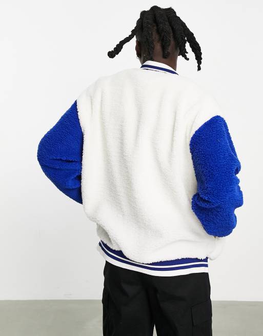 ASOS DESIGN oversized varsity jersey jacket in sherpa with badging