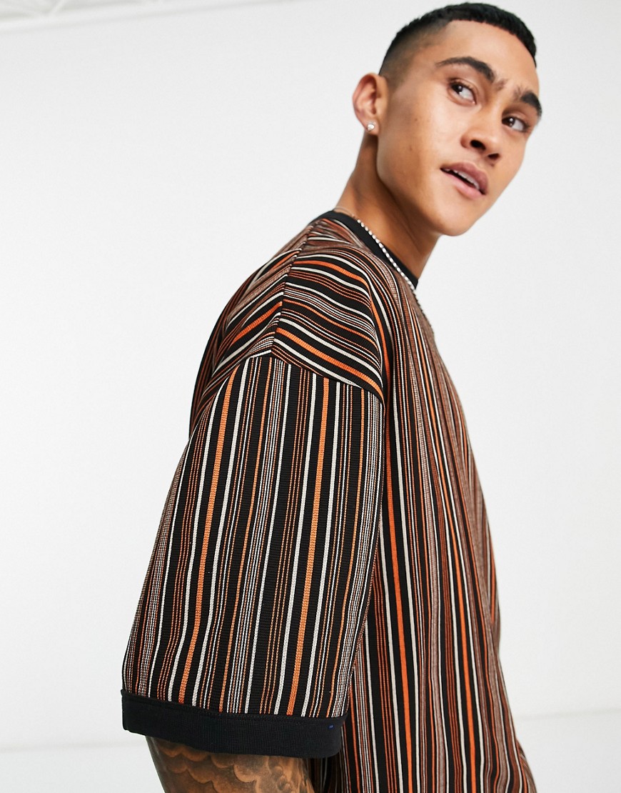 ASOS DESIGN oversized vertical jacquard stripe T-shirt in black & orange