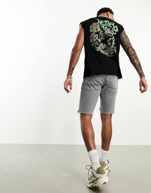 ASOS DESIGN oversized vest in black with back plant print