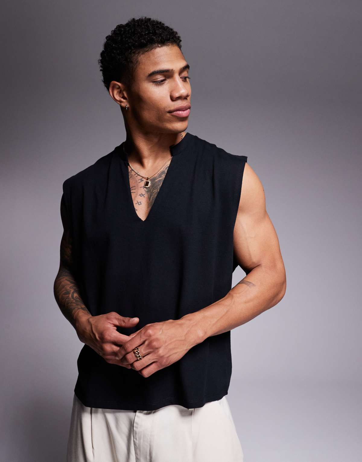 ASOS DESIGN oversized vest with v-neck in black