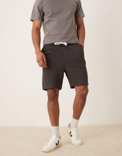 ASOS DESIGN oversized waffle shorts in washed black