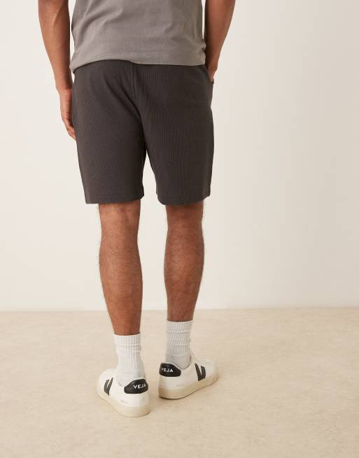 ASOS DESIGN oversized waffle shorts in washed black