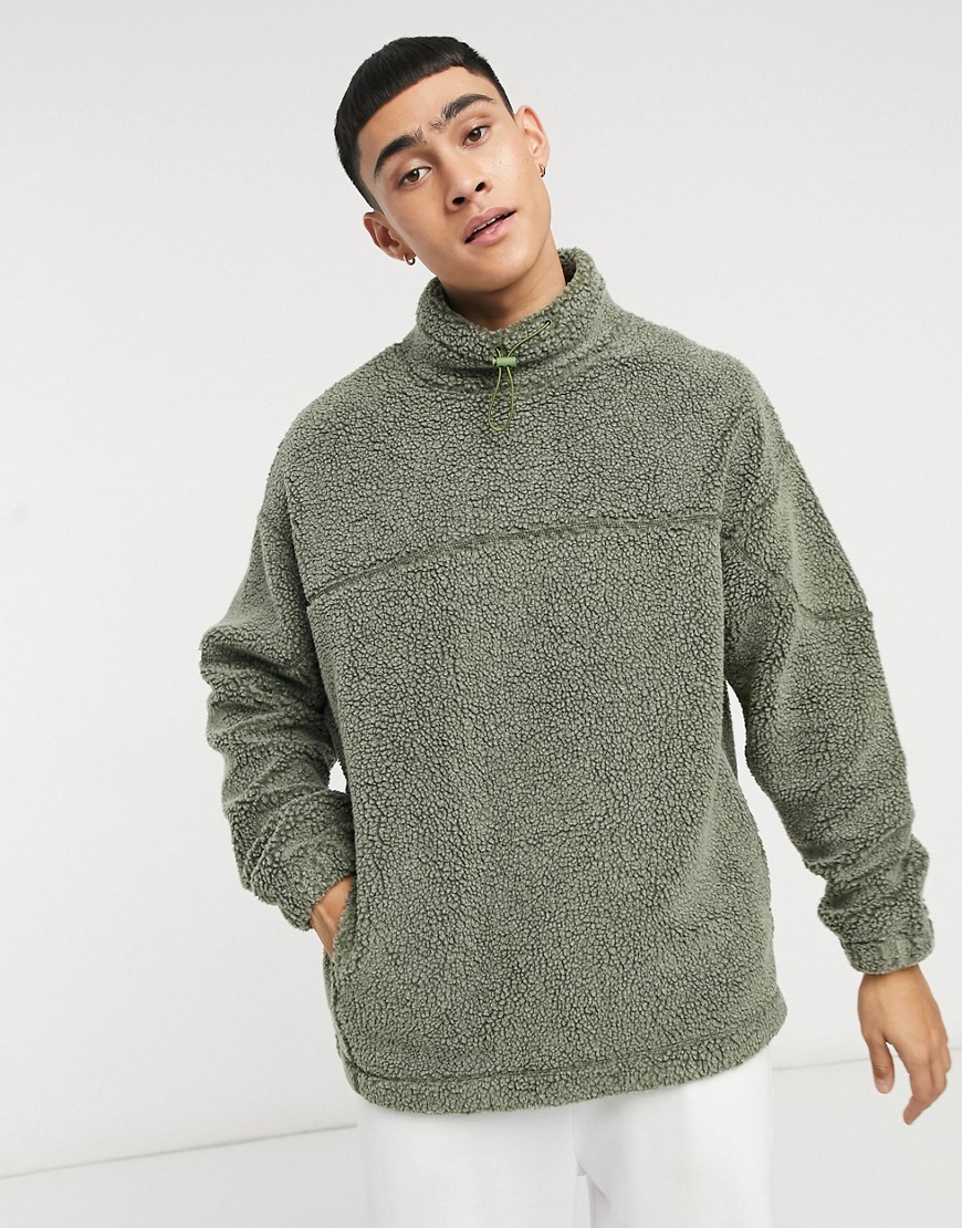 ASOS DESIGN oversized washed teddy funnel neck sweatshirt with seam details-Green