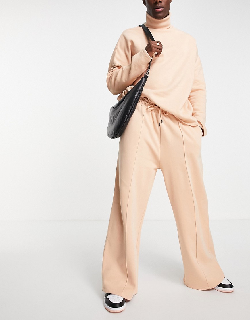 ASOS DESIGN oversized wide leg sweatpants with pintucks in beige - part of a set-Neutral