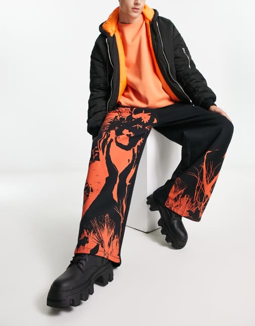 ASOS DESIGN oversized wide leg trackies in black with photographic print