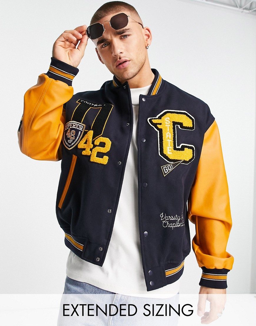 ASOS DESIGN oversized wool look varsity bomber jacket with contrast leather look sleeves in navy
