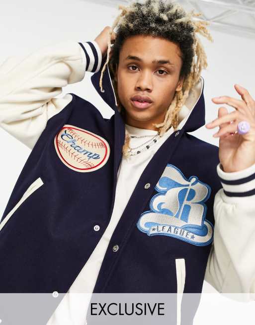 ASOS DESIGN oversized varsity jacket with badges in blue