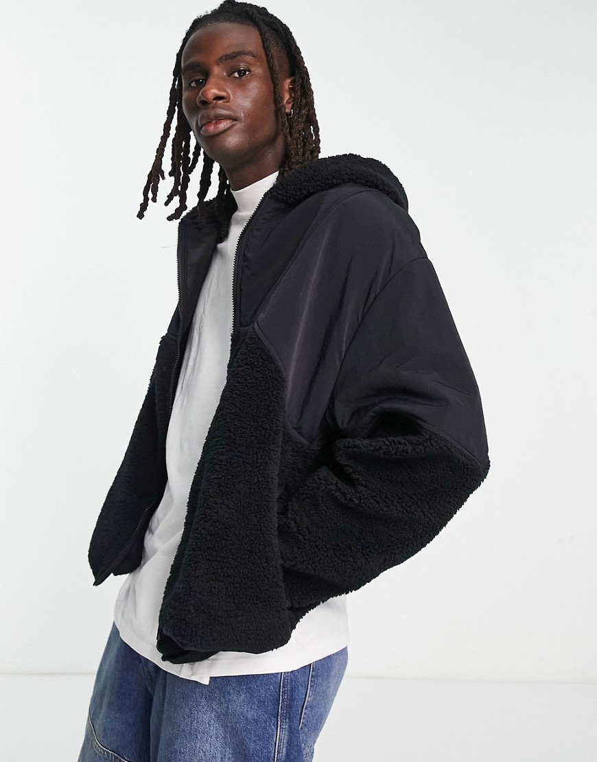 ASOS DESIGN oversized zip through hoodie in black nylon & borg
