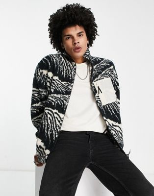 ASOS DESIGN oversized zip up jacket in black teddy with all over print | ASOS