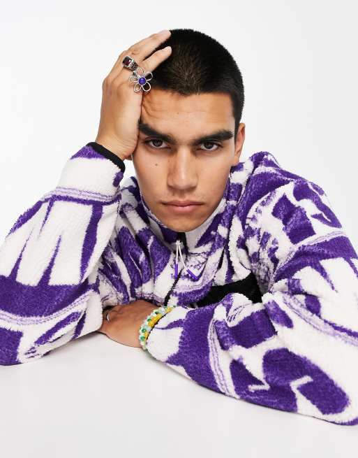 ASOS DESIGN oversized zip up jacket in purple borg with all over text print