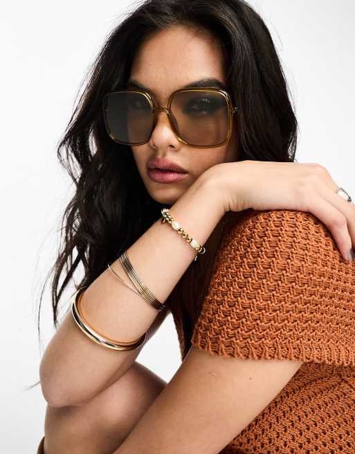 ASOS DESIGN - Oversized zonnebril in jaren 70-stijl met buisvormig ontwerp in kristalbruin
