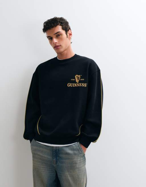 ASOS DESIGN oversize’owa bluza z Guinness w czerni, 3 z 5