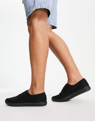 nike black plimsolls