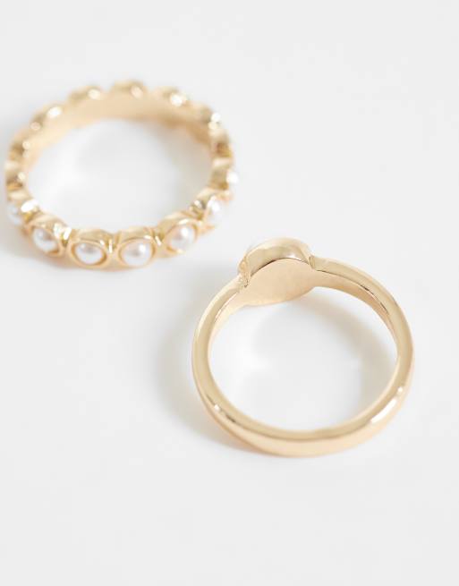 ASOS DESIGN - Pack de anillos dorados con detalle de perlas de imitación pequeñas, 2 de 3