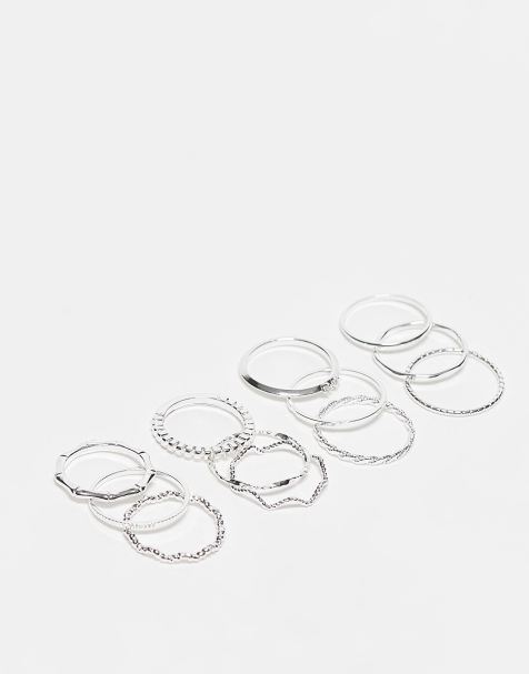 ASOS DESIGN pack of 12 rings with twist details and engraved designs in silver tone - view 1