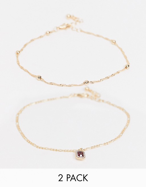 ASOS DESIGN pack of 2 anklets with red jewel charm in gold tone