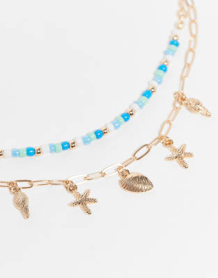 Asos Design Pack Of 2 Anklets With Sea Shell Charms And Beaded Design