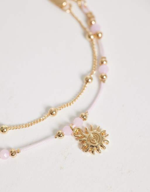 ASOS DESIGN pack of 2 beaded anklets with sun charms in pink and gold tone, 2 of 3