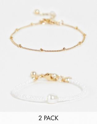 ASOS DESIGN pack of 2 bracelet with micro faux pearl and dot dash chain in gold tone | ASOS