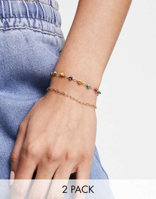 ASOS DESIGN pack of 2 bracelets with multi color eye charms in gold tone