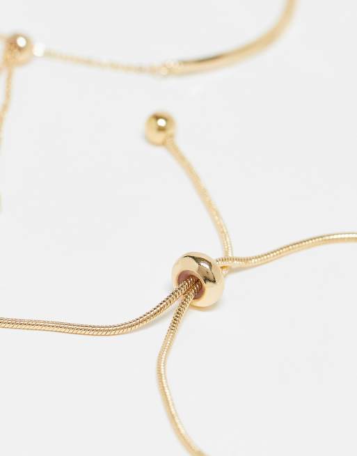 ASOS DESIGN pack of 2 bracelets with simple toggle detail in gold tone
