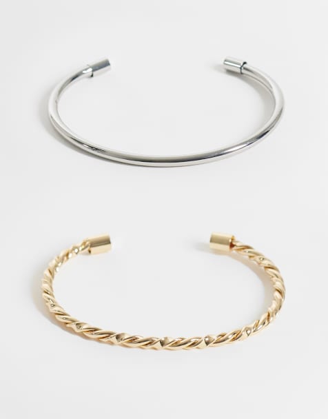 ASOS DESIGN pack of 2 cuff bracelets with plain and twist detail in gold tone - view 1