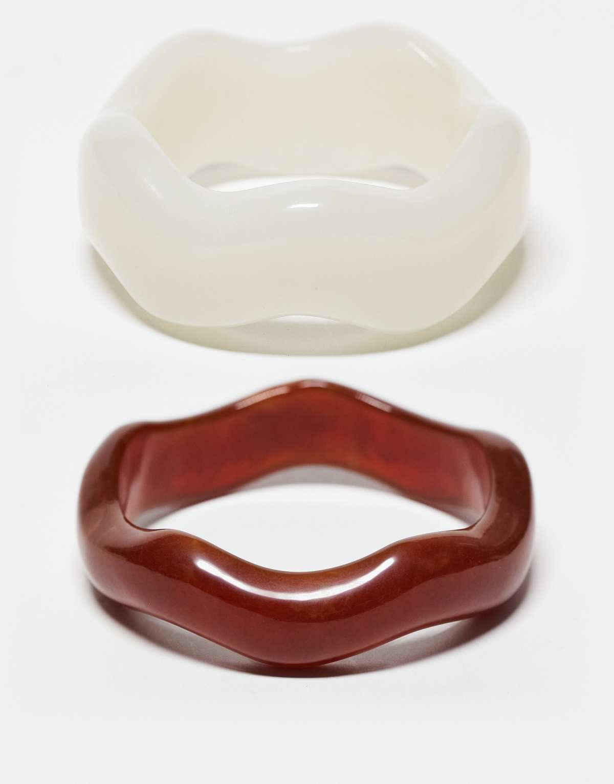 ASOS DESIGN pack of 2 resin bangles in wavy design