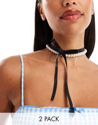 ASOS DESIGN pack of 2 short necklaces with faux pearl and black bow design-Multi