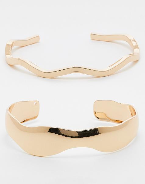 ASOS DESIGN pack of 2 simple cuff bracelets in gold tone - view 1
