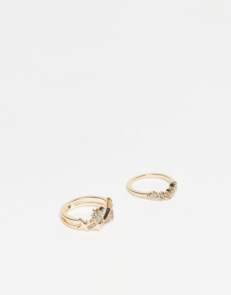 ASOS DESIGN pack of 2 sparkly diamante stacking rings with star design in gold tone - view 1
