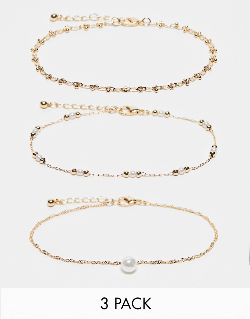 ASOS DESIGN pack of 3 anklets with faux pearl and ball design in gold tone