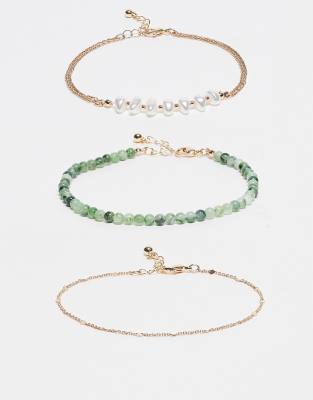 ASOS DESIGN pack of 3 anklets with faux precious green stones, faux pearls and gold tone chain